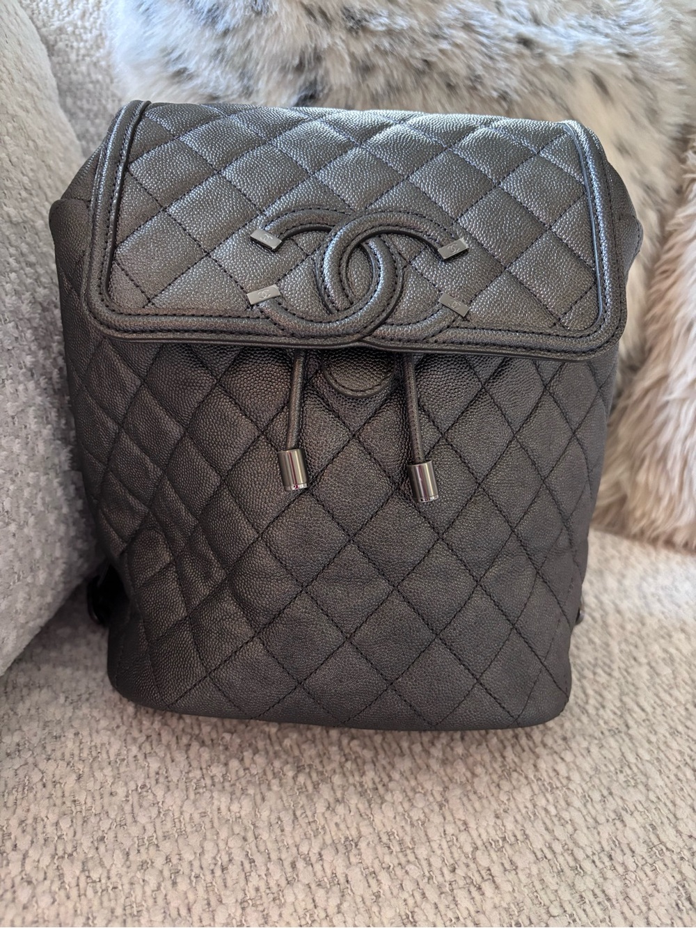 CHANEL Quilted Caviar Leather Backpack in Dark Gray
